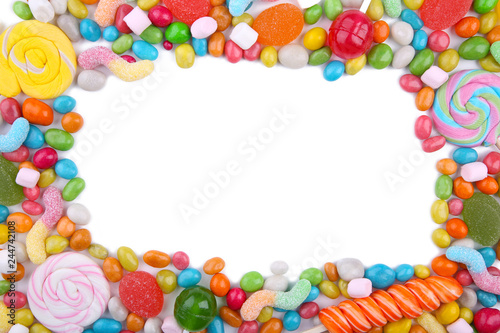 Colorful lollipops and different colored round candy isolated