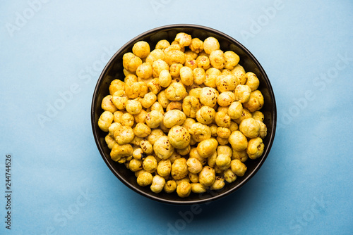 Roasted Phool Makhana or Crispy Lotus pops Seed served in a bowl, selective focus