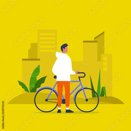 Young white male character standing with a bike