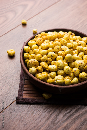 Roasted Phool Makhana or Crispy Lotus pops Seed served in a bowl, selective focus