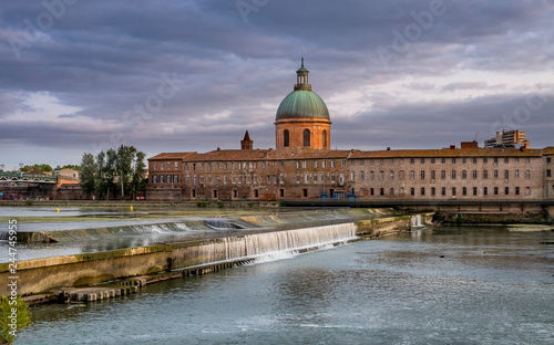 View of Garonne river in Toulouse city center at sunset photo