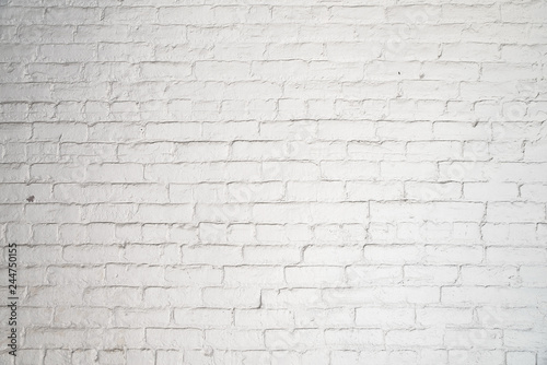 texture stained old stucco light gray and aged paint white brick wall background in rural room