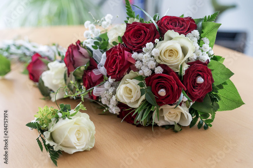 Beautiful bouquet of white and red roses for wedding © kelifamily