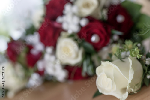 Beautiful bouquet of white and red roses for wedding