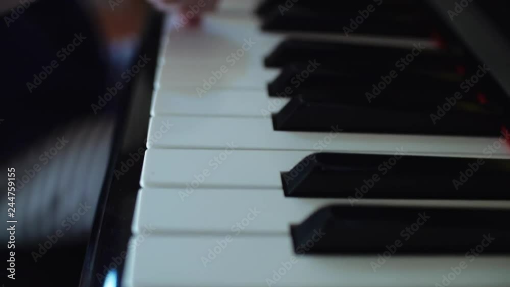 Adorable Child Pushing Piano Keys Adorable Child Pushing Piano Keys