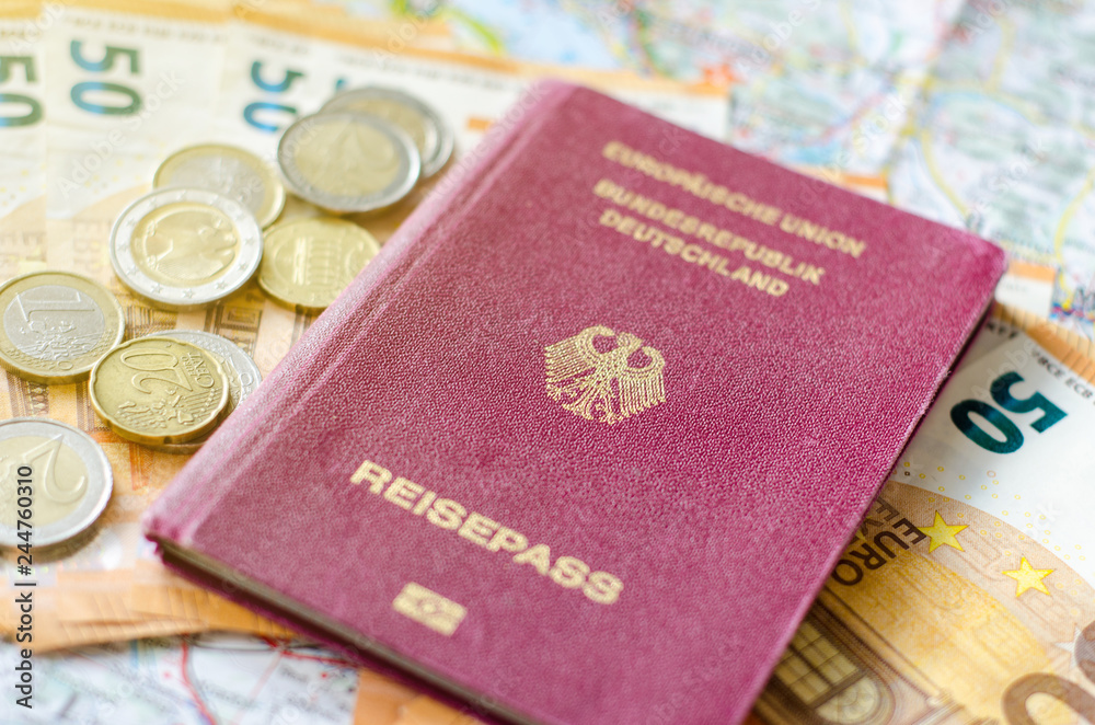 German passport with money on the map.
