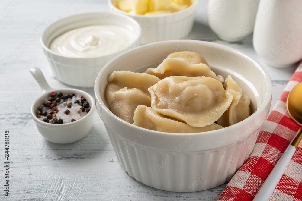 Traditional pelmeni, ravioli, dumplings with meat, close-up. Traditional pelmeni, ravioli, dumplings with meat, close-up.