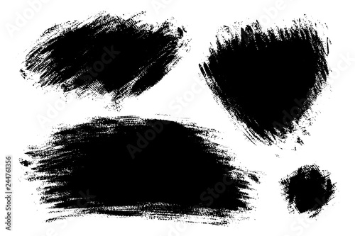 Vector set of big hand drawn brush strokes  stains for backdrops. Monochrome design elements set. One color monochrome artistic hand drawn backgrounds various shapes.