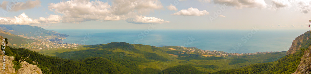 View from mount AI-Petri on the Black sea in the Crimea. On the left is the city of Yalta. Panorama of 4 pictures