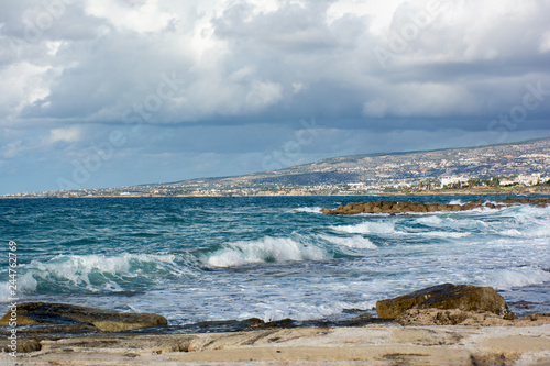 Beautiful view of the Mediterranean seashore with Kissonerga village on the background. Paphos, Cyprus