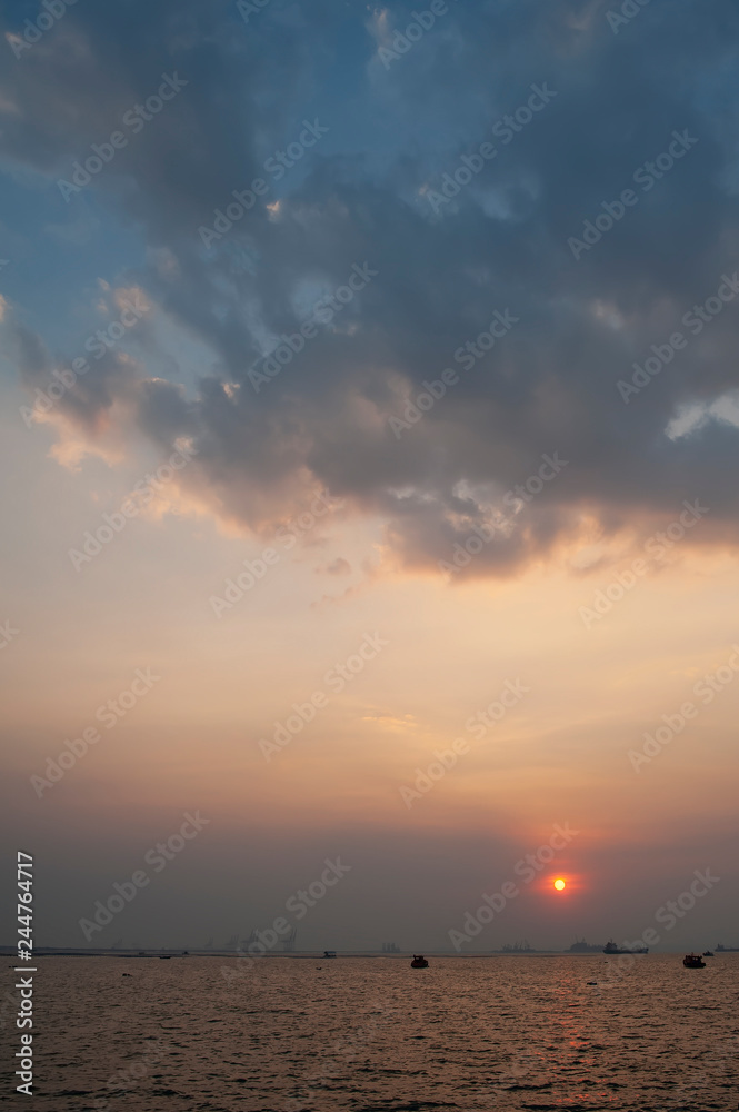 Beautiful sunshine and colorful cloud,Colors light of sunset,minimal sun in the sky