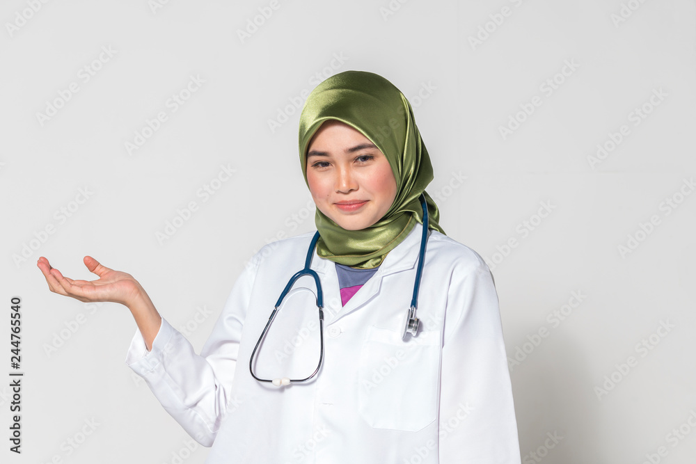 Veiled teenager muslimah with medical concept. Veiled teenager muslimah with medical concept.