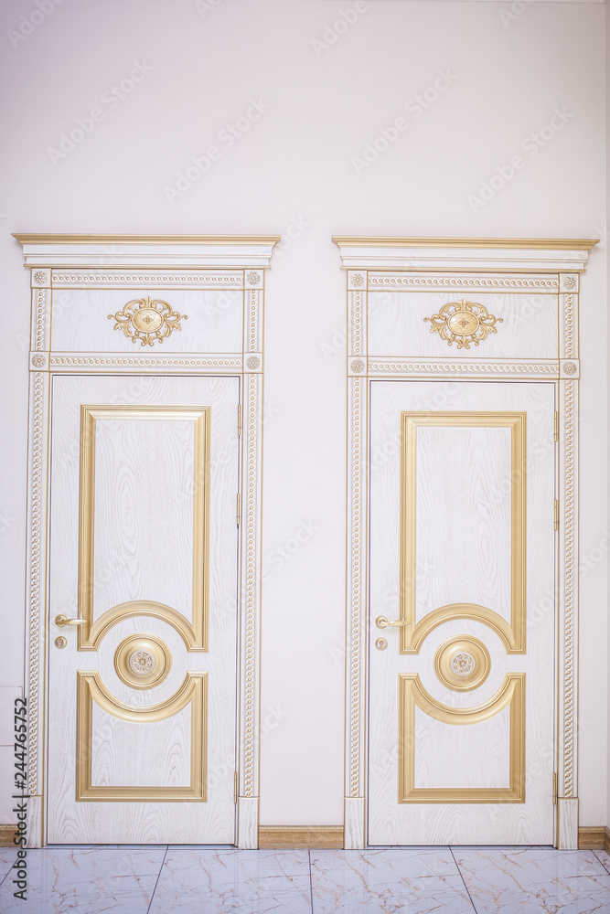 white wooden doors with baguettes