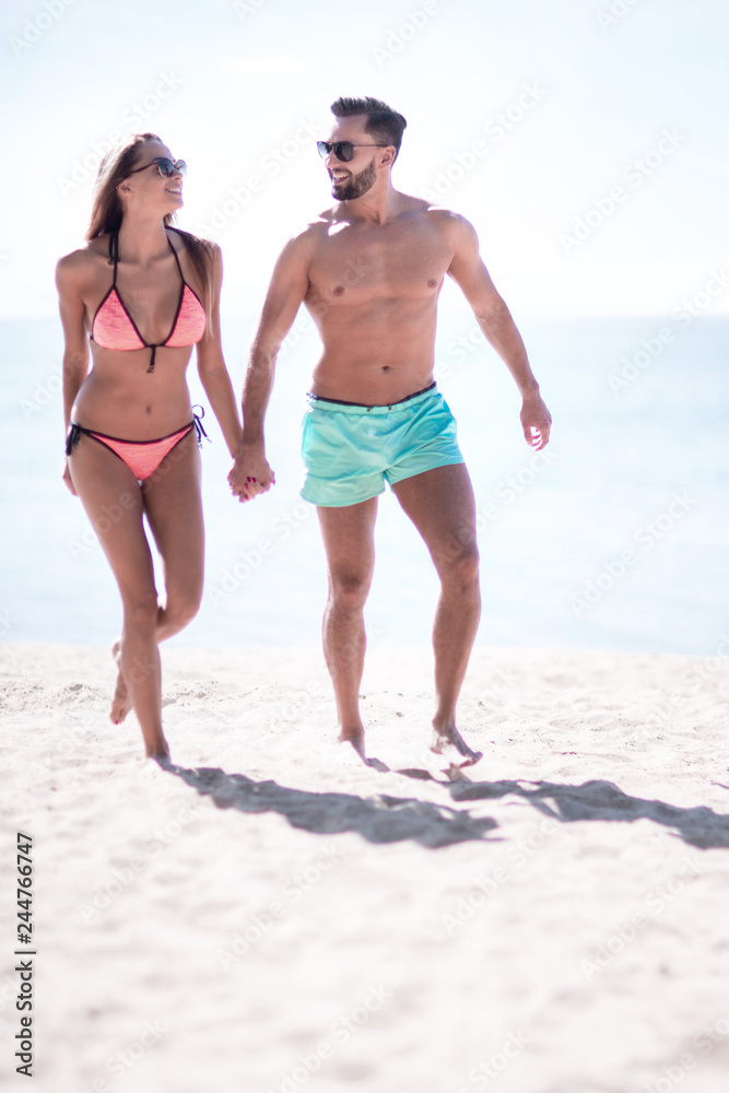 Picture of happy couple on the beach.