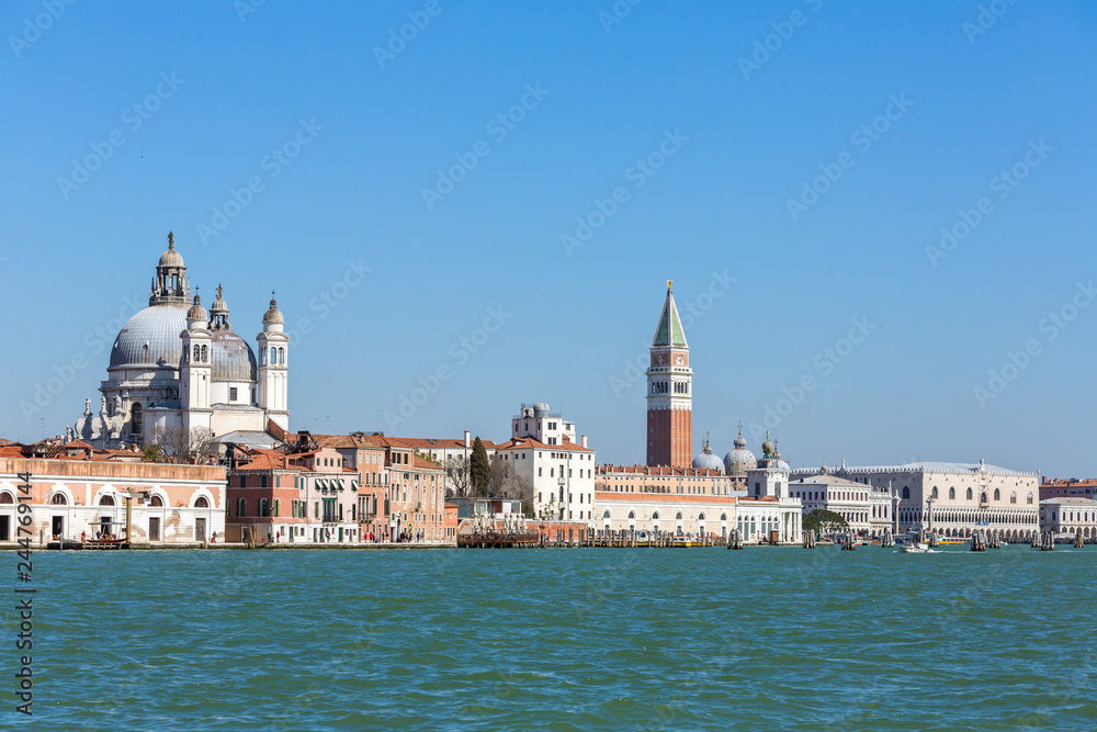 Waterfront view of Santa Maria della Salute, San Marco square and Doge's Palace in Venice, Italy