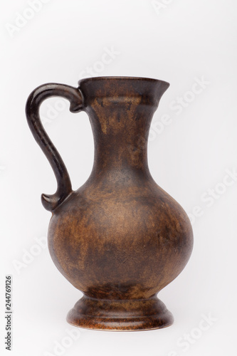 Old brown vase on the white background