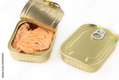 Open canned fish. Smocked salmon filets. photo