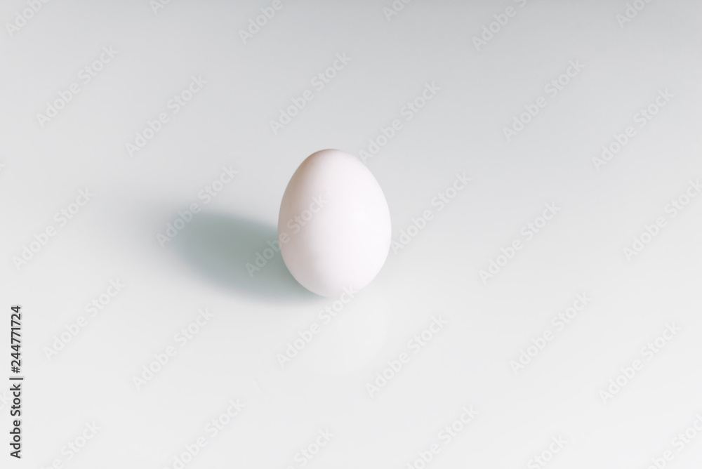 White egg is isolated on a white background. Concept Of Easter. Concept of healthy eating.