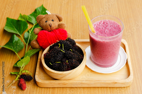 Homemade mulberry juice drink on wooden backgrounds