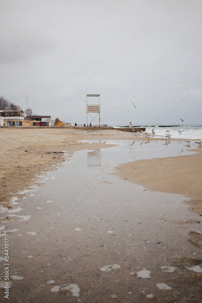 old abandoned rescue tower on the background of the beach in winter old abandoned rescue tower on the background of the beach in winter