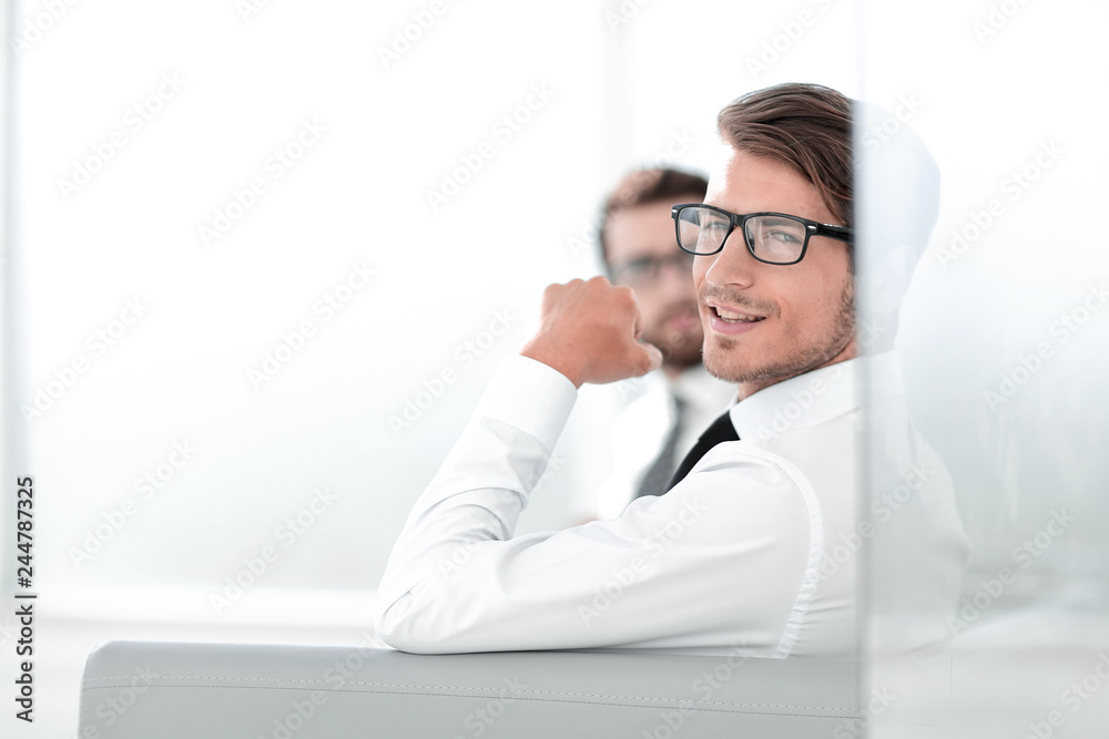 Fototapeta premium serious employees sitting in the office waiting room