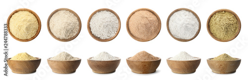 Fototapeta Set of organic flour in wooden bowls on white background