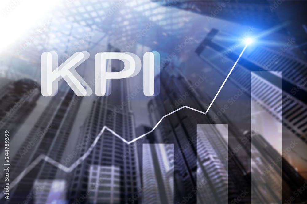 KPI - Key Performance Indicator. Business and technology concept. Multiple exposure, mixed media. Financial concept on blurred background KPI - Key Performance Indicator. Business and technology concept. Multiple exposure, mixed media. Financial concept on blurred background