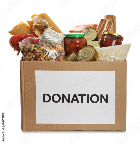 Donation box full of different products on white background