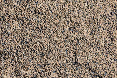 Background with different and small sea pebbles.