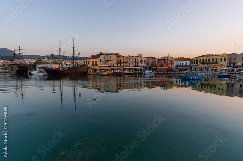 Greece, Crete Rethymno, panoramic view old venetian harbor at the sunset. 