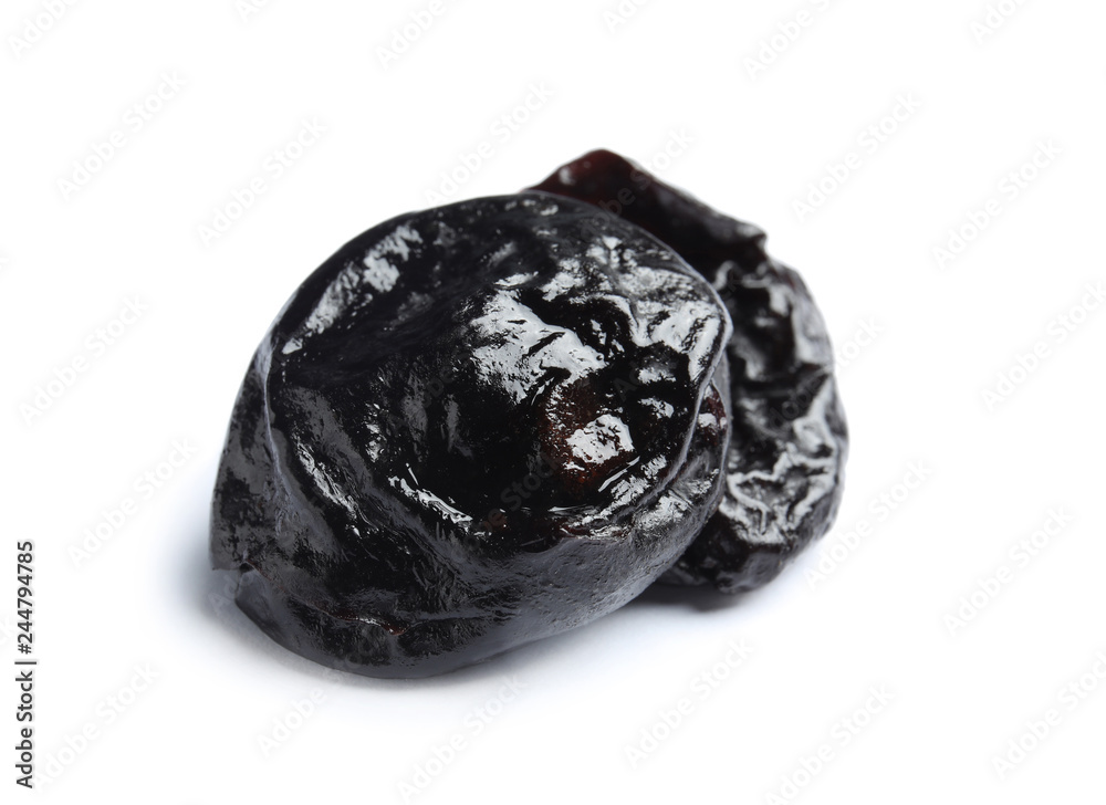 Tasty prunes on white background. Dried fruit as healthy snack