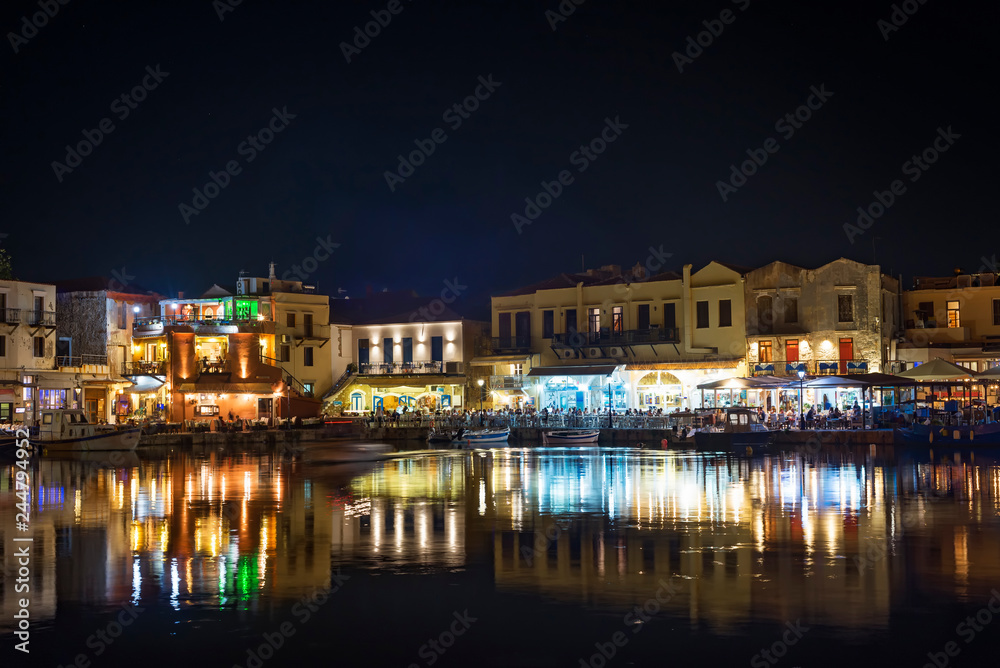 Naklejka premium Greece, Crete Rethymno, old venetian harbor at the night.