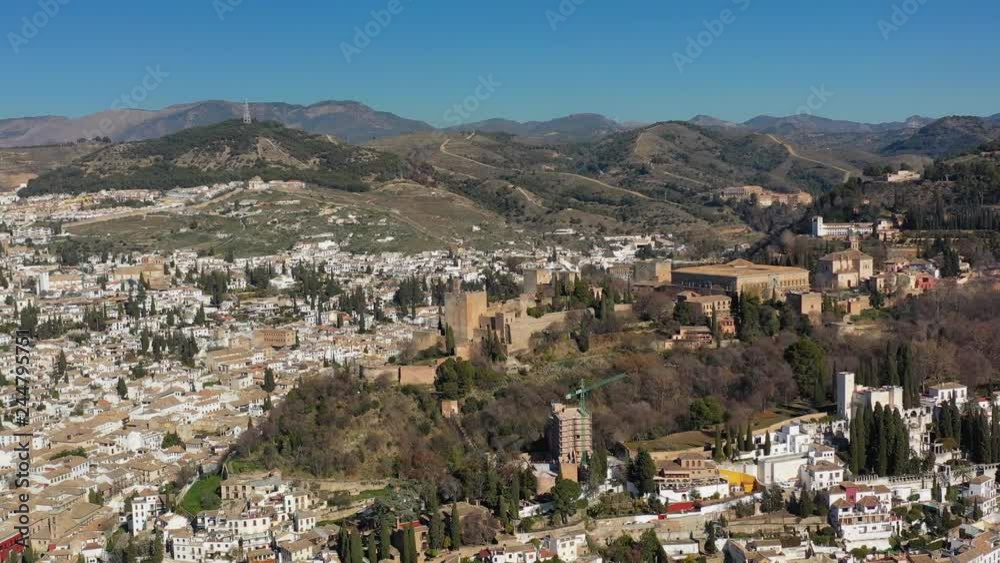 Aerial view of cityscape of Granada, famous historic city, monumental castle/palace complex of Alhambra - landscape panorama of Andalusia from above, Spain, Europe Aerial view of cityscape of Granada, famous historic city, monumental castle/palace complex of Alhambra - landscape panorama of Andalusia from above, Spain, Europe