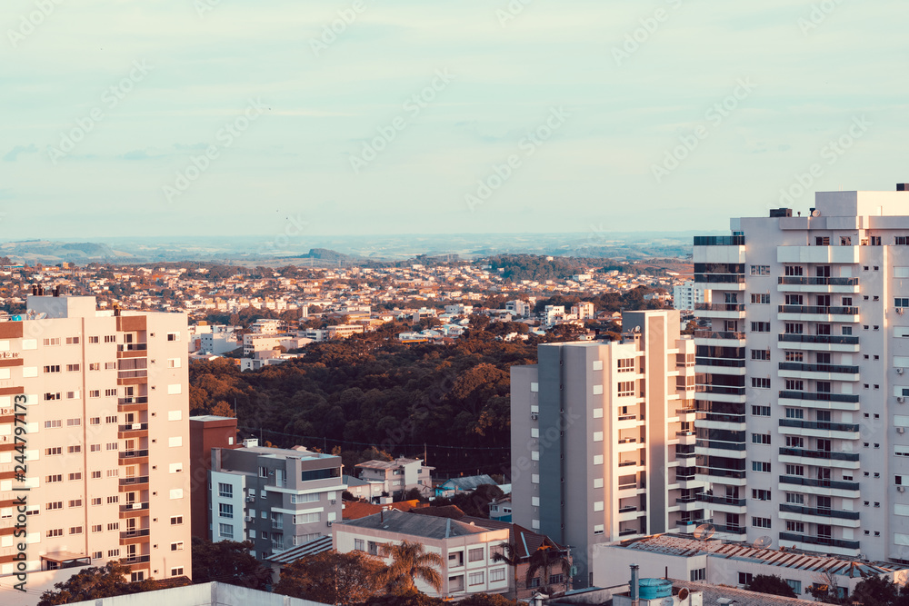 Fototapeta premium Top view of the city in a autumn sunset