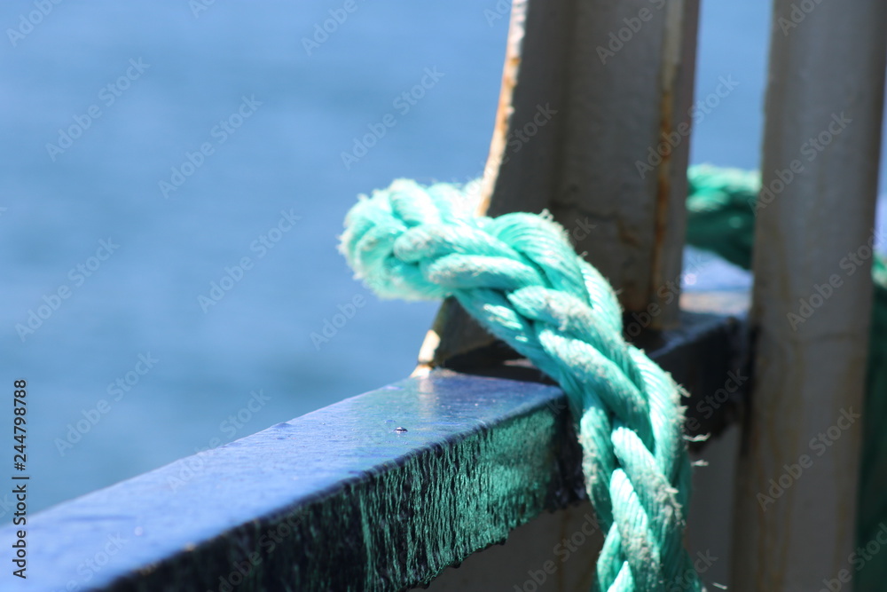 Ropes and equipment on large passenger ferry boat during summer a vacation 