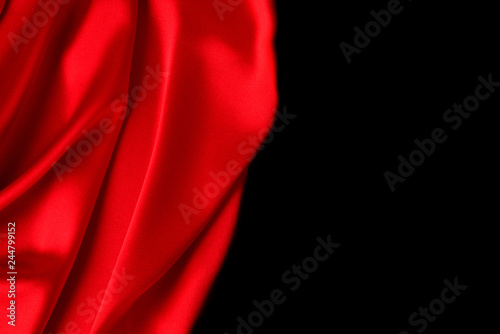 Red silk or satin luxury fabric texture can use as abstract background. Top view