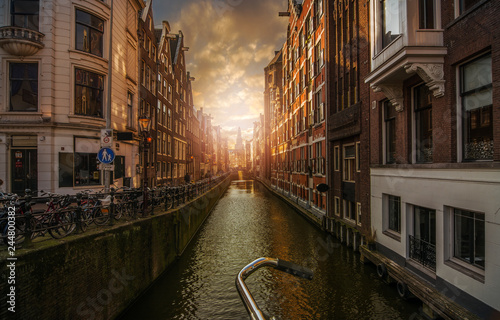 Beautiful view of Amsterdam canal at the sunset. 