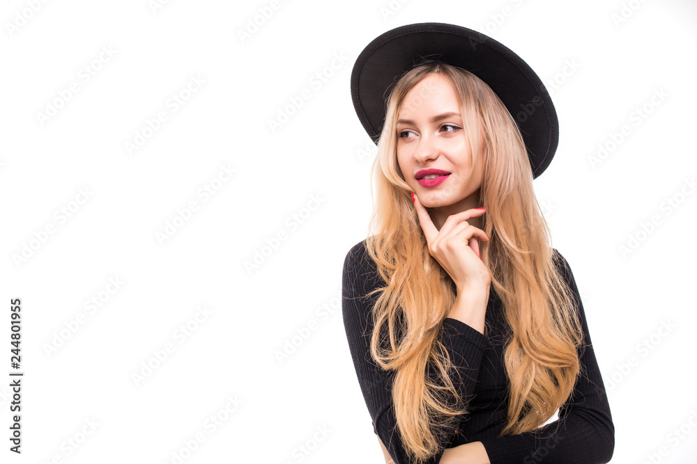 Portrait of young blonde woman in black floppy hat thinking isolated on white background Portrait of young blonde woman in black floppy hat thinking isolated on white background