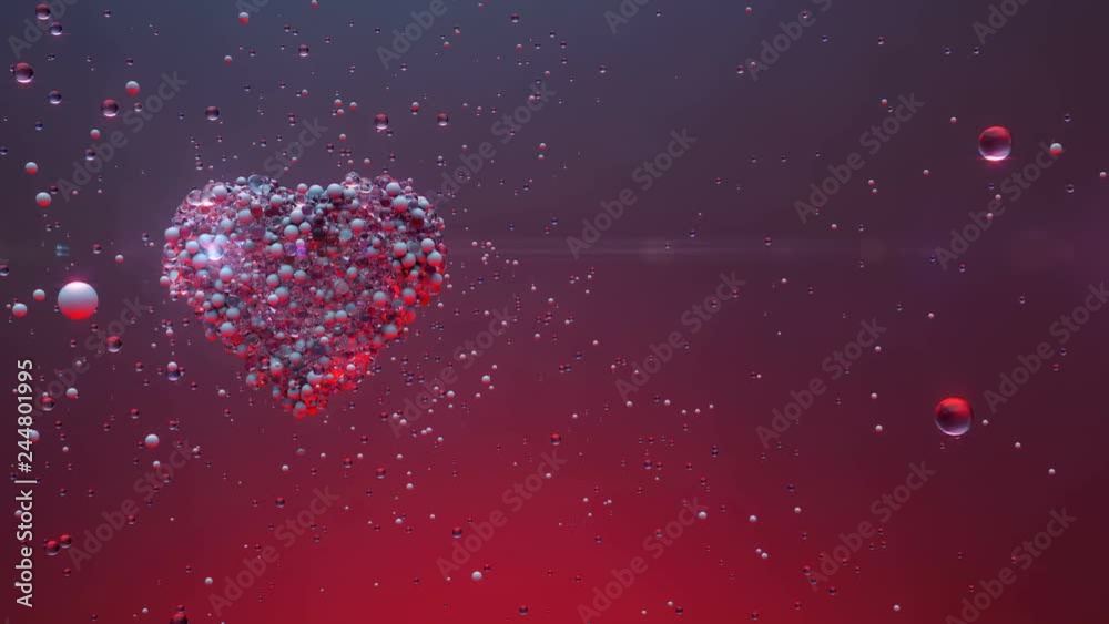 Valentines day Love intro.Shining Glass balls create valentines heart and exploding.Good for love story intro and wedding video. Valentines day present and memories.Twinkling heart.Pink,red,Purple.