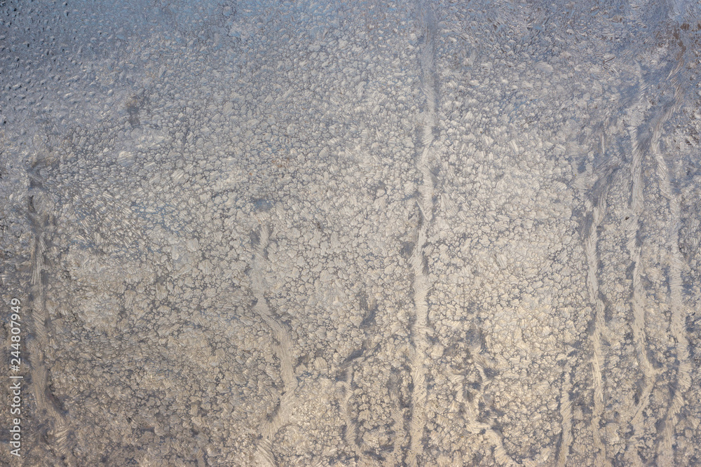 frosty patterns on the winter window frosty patterns on the winter window