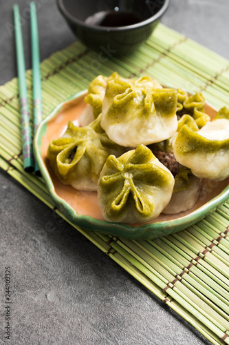 Mongolian Food: Buuz with spinach (Steamed Mongolian Dumplings) photo