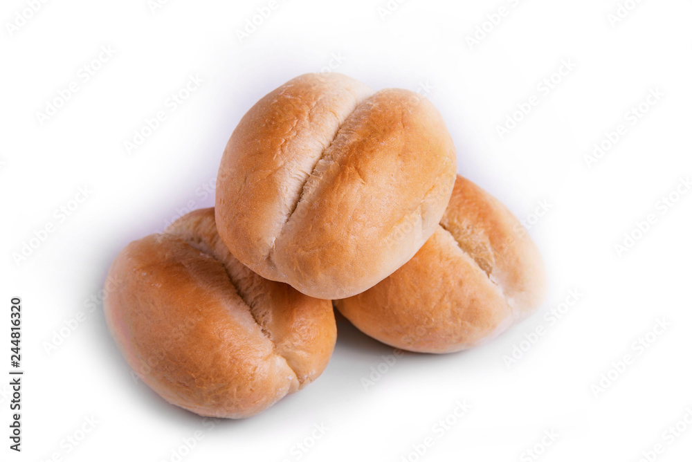 Three freshly baked buns isolated on white background Three freshly baked buns isolated on white background
