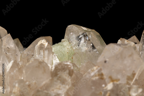 Macro mineral stone Prehnite quartz on a black background