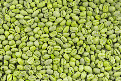 Quadro su tela Green coffee beans background