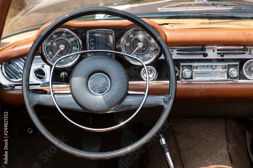 Close up on a dashboard of a vintage car