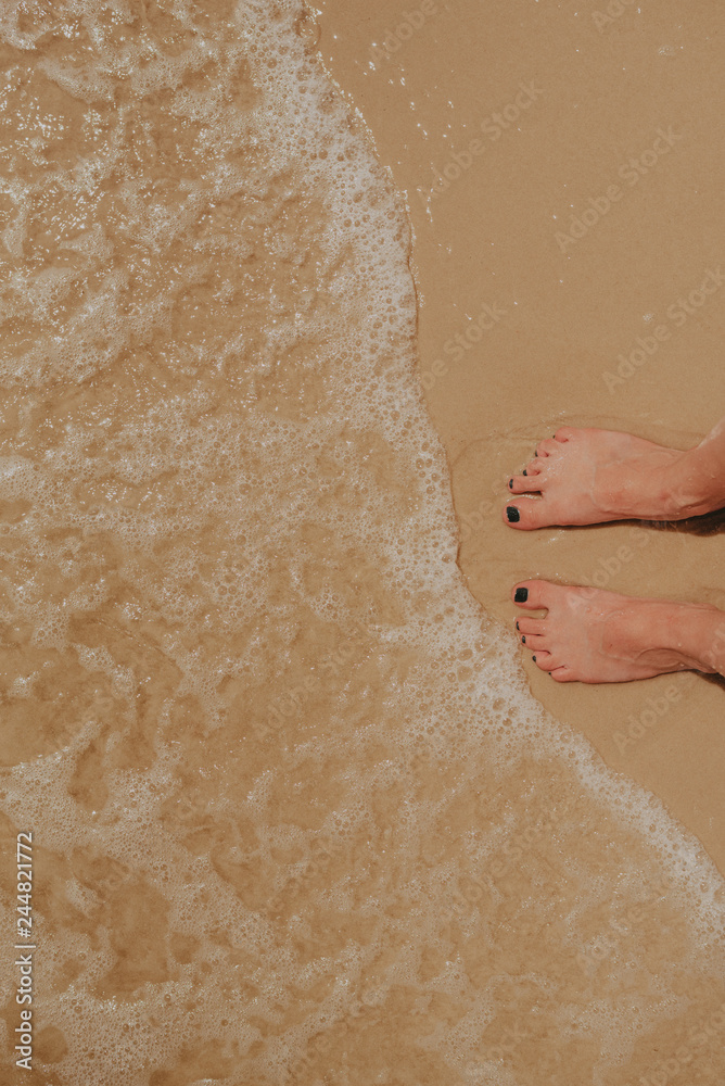 Fototapeta premium Feet in the water