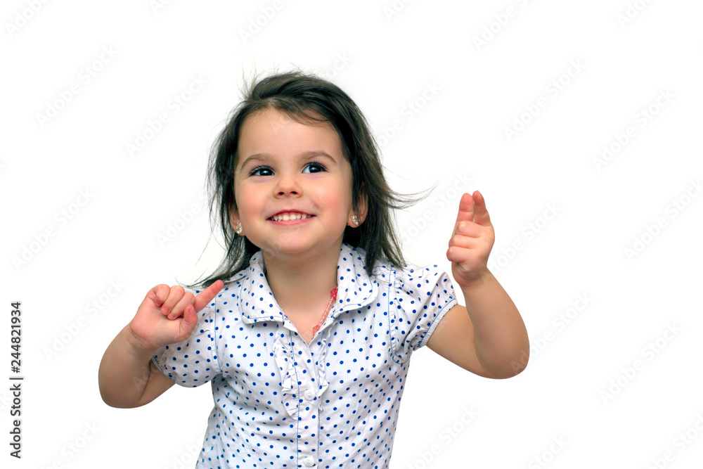 funny little smiling girl jumps and shows fingers. Studio shot on white background funny little smiling girl jumps and shows fingers. Studio shot on white background