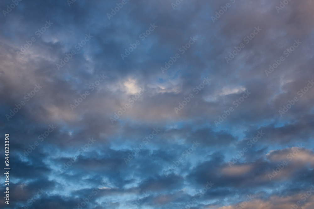 Beautiful contrast evening sky with grey clouds texture