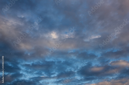 Beautiful contrast evening sky with grey clouds texture