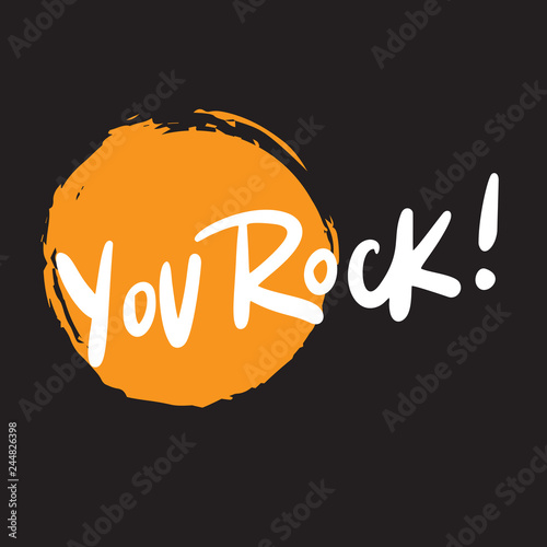 You rock. Funny hand written lettering. White inscription on black bacground with orande spot. photo